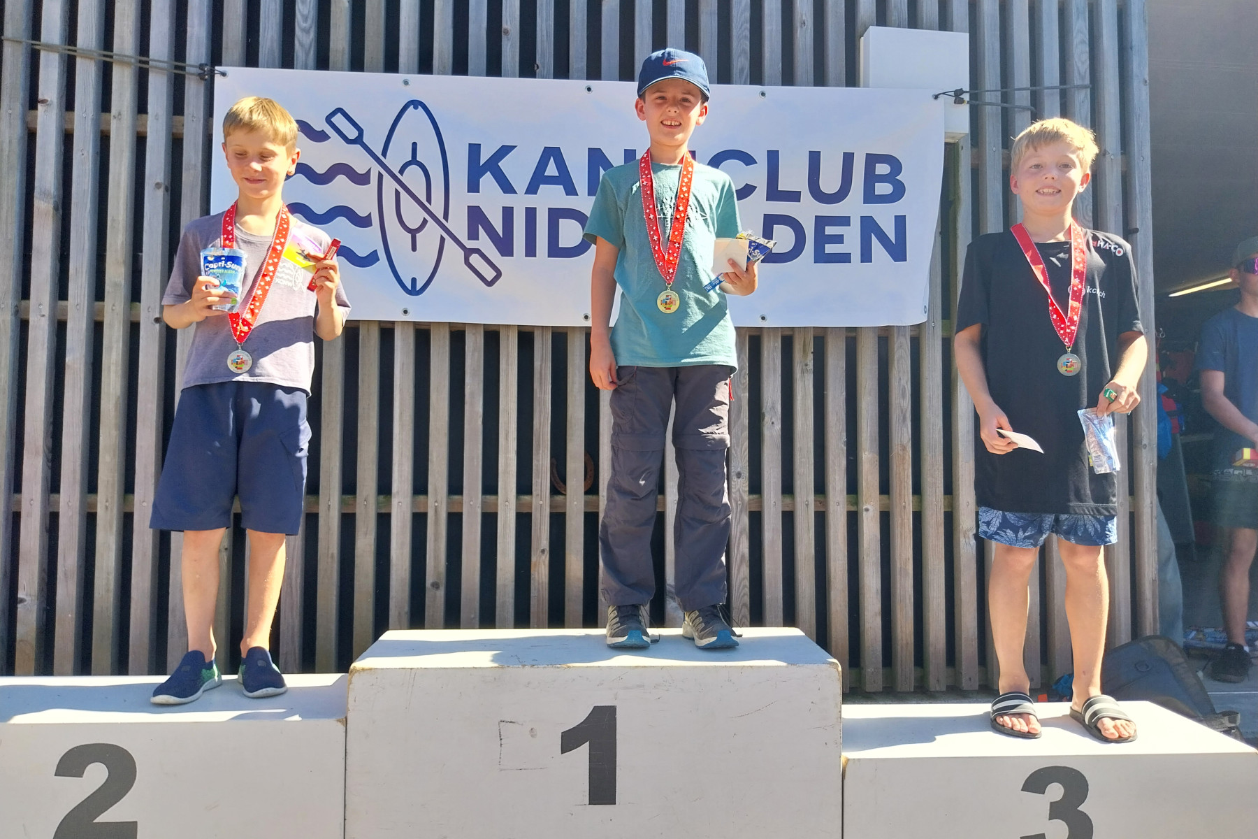 KCNW Podest Kids männlich